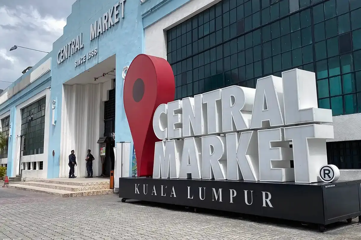 Main entrance of Central Market in Kuala Lumpur, with its light-blue façade and large Central Market sign.
