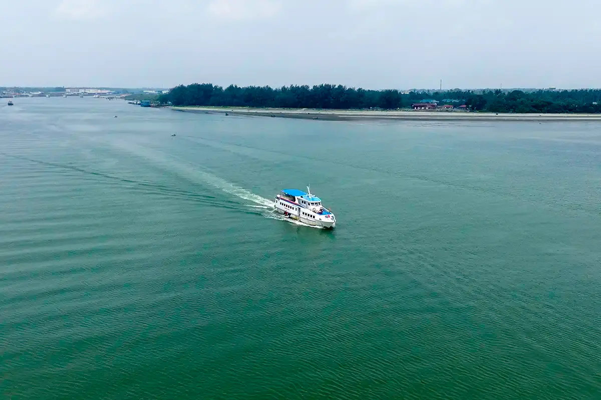 Ferry leaving Tanjung Gemok through the Endau River mouth towards Tioman Island