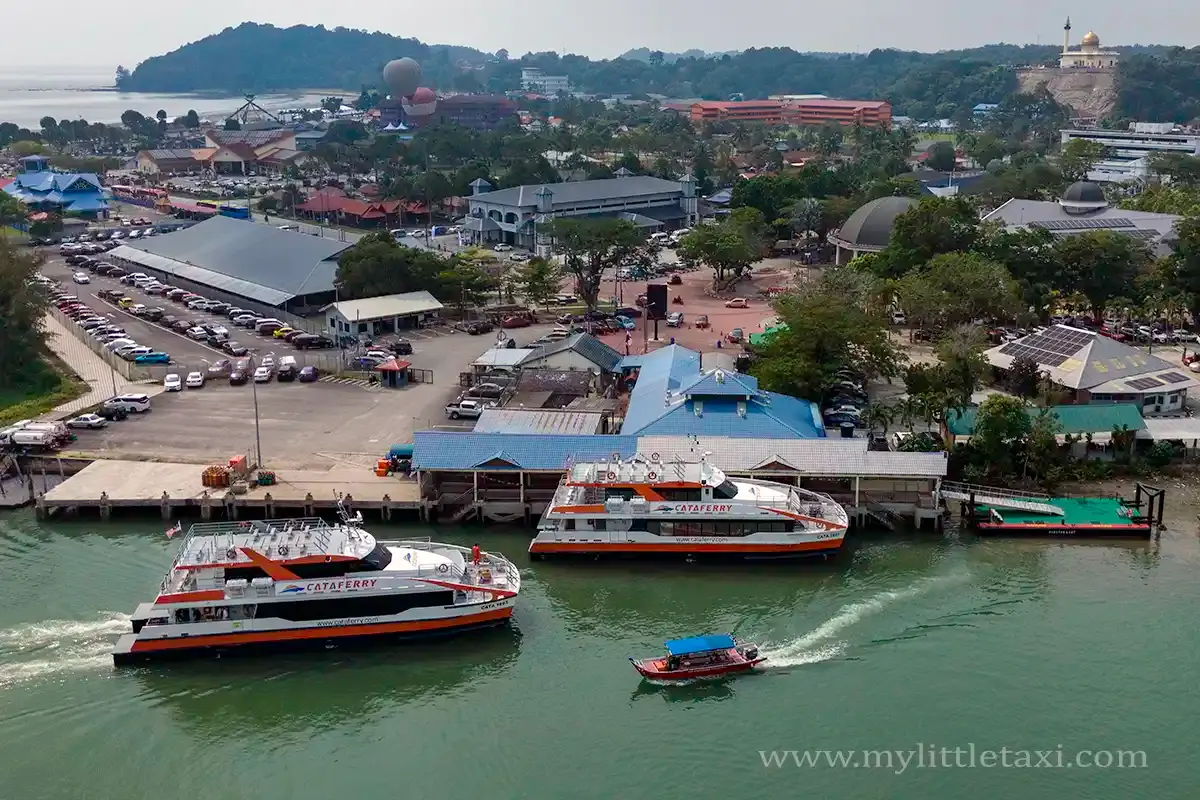 Aerial view of Mersing Jetty with ferry boats and the waterfront terminal in Mersing, Johor
