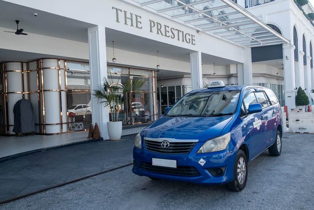 Toyota Innova private transfer arriving at a hotel in Penang from Kuala Lumpur