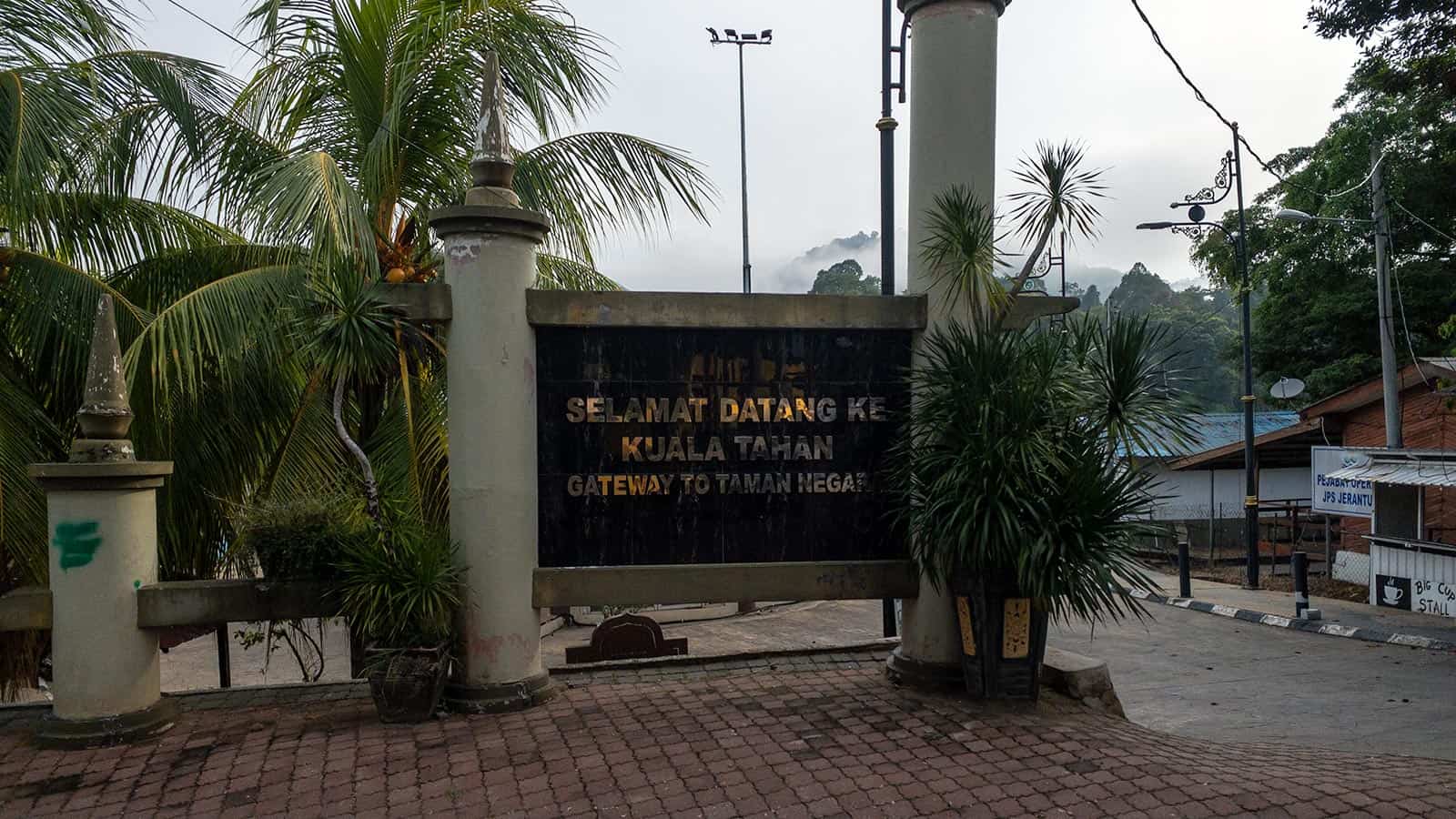 Kuala Lumpur to Taman Negara private transfer — Welcome to Kuala Tahan gateway sign, Pahang